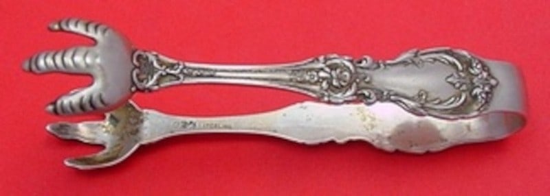 Sterling Silver Sugar Tong Burgundy Pattern 4 1/8 Inch: Sterling Silver Sugar Tong Burgundy Pattern 4 1/8 Inch This is a Reed & Barton sterling silver sugar tong in the Burgundy pattern. Measuring 4 1/8 inches, this serving piece is not monogrammed and is 