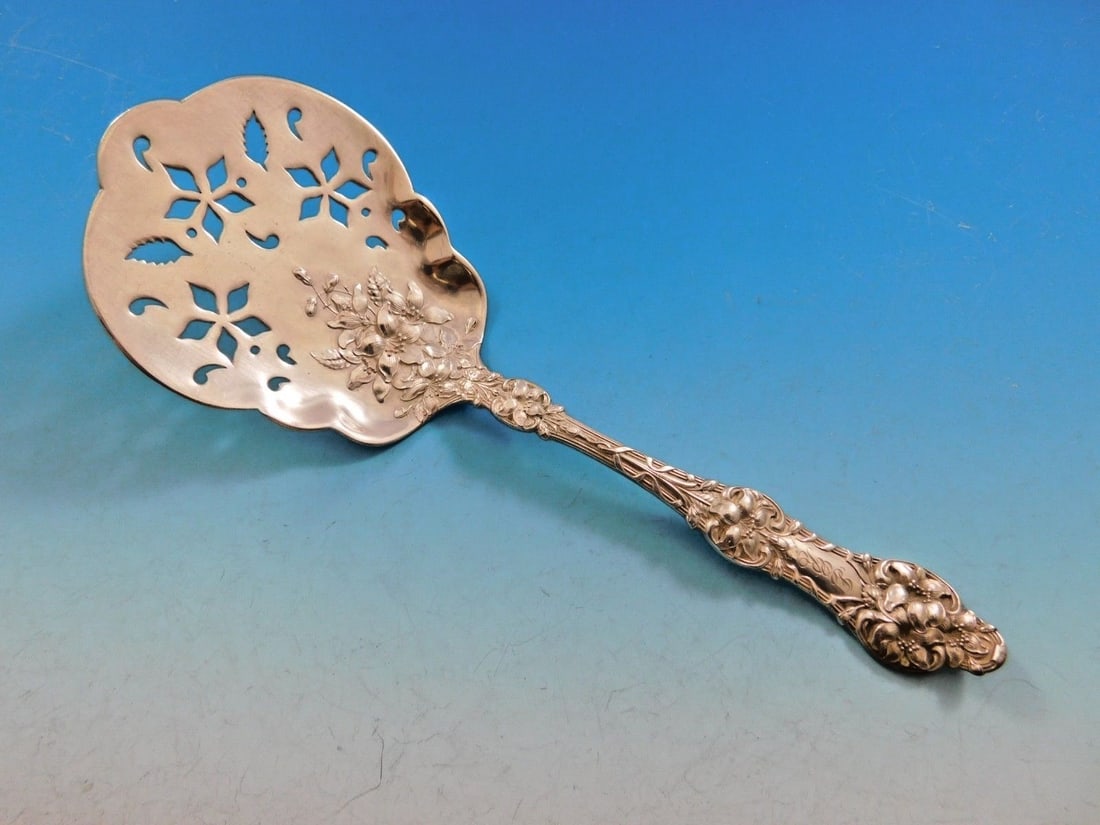 Alvin Old Orange Blossom Sterling Silver Tomato Server 8 Inch: Alvin Old Orange Blossom Sterling Silver Tomato Server 8 Inch This exquisite tomato server, crafted from sterling silver, showcases the Old Orange Blossom pattern by Alvin, dating back to circa 1905. 