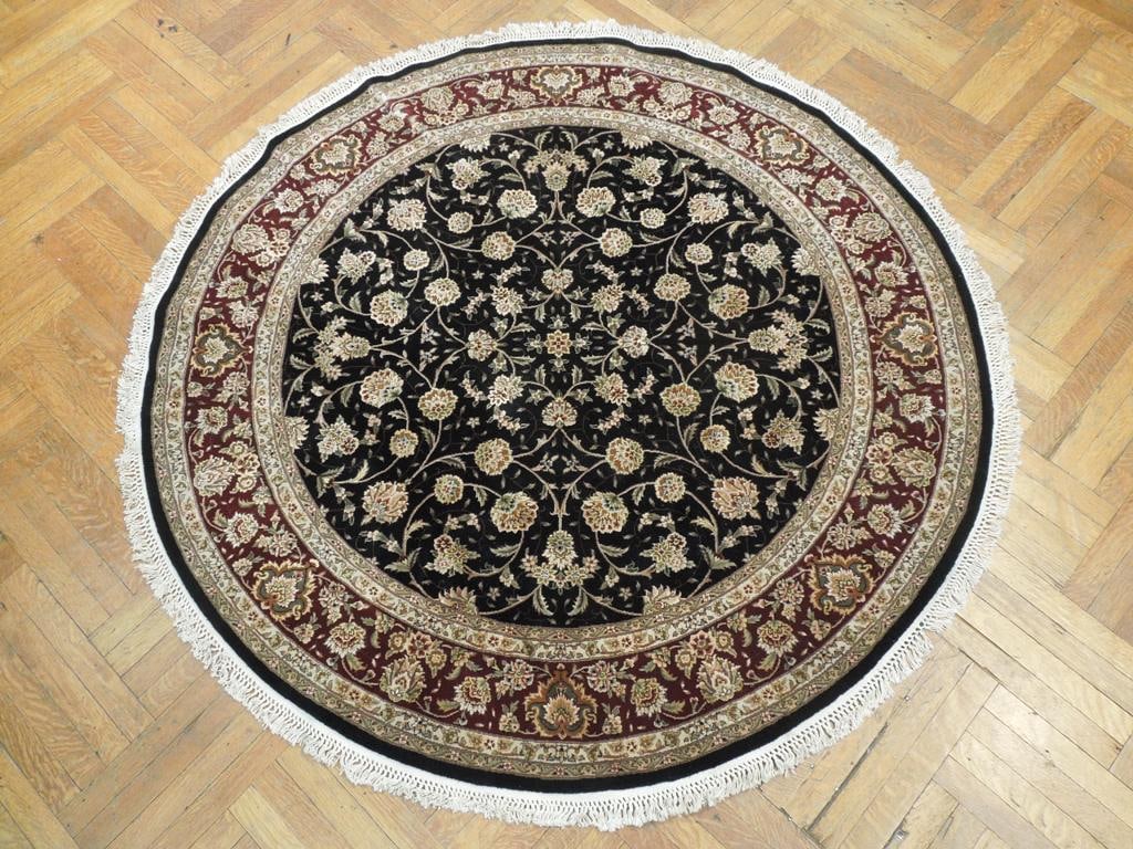 5' x 5' Black Wool & Silk Hand-Knotted Round Area Rug: 5' x 5' Black Wool & Silk Hand-Knotted Round Area Rug Free continental US Shipping Introducing a stunning 5' x 5' round rug that seamlessly combines luxury and sophistication. This Black Fine Quality 