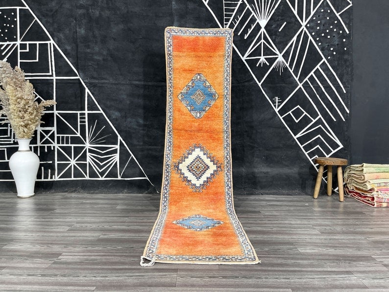 Luxury Handwoven Runner Rug 100% Wool from Morocco: Luxury Handwoven Runner Rug 100% Wool from Morocco Enhance your space with this Luxury Authentic Runner Rug, meticulously handwoven in the Atlas Mountains by local Berber women weavers. Crafted using 