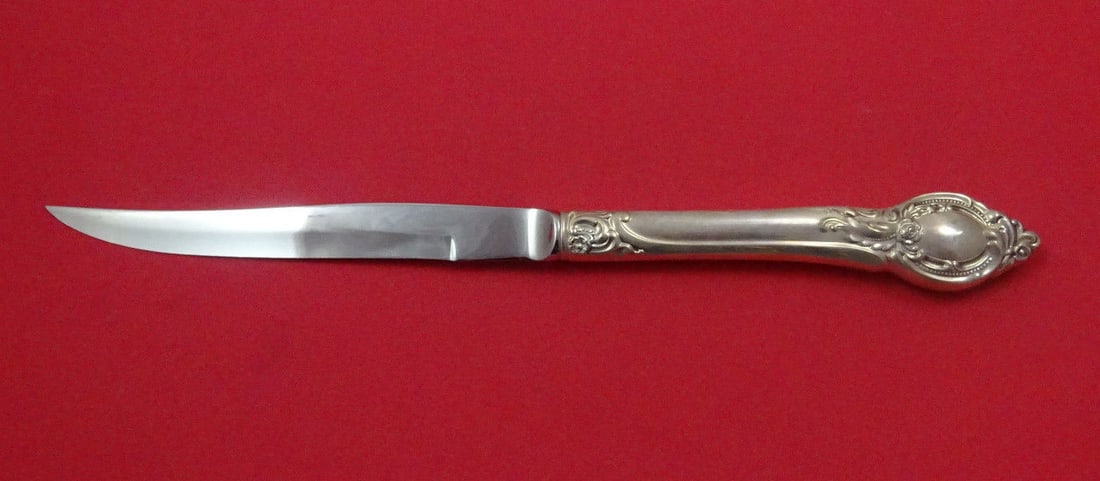 Reed and Barton Cameo Sterling Silver Handle Steak Knife 9 5/8 Inch Blade: Reed and Barton Cameo Sterling Silver Handle Steak Knife 9 5/8 Inch Blade This Cameo steak knife features a sterling silver hollow handle crafted by Reed & Barton, paired with a stainless steel origin