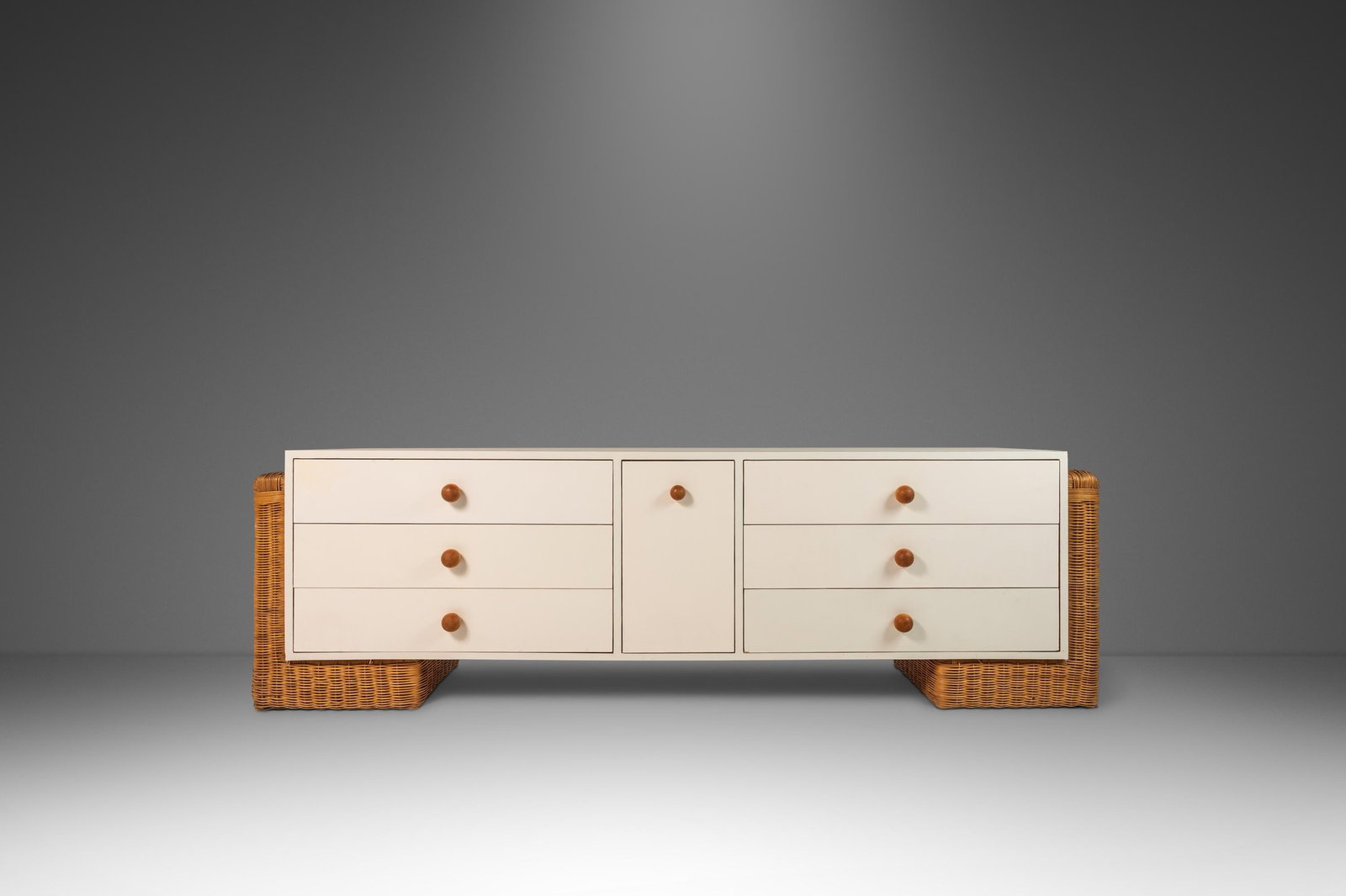 1980s Mid-Century Modern Boho Chic Long Dresser with Rattan Base: 1980s Mid-Century Modern Boho Chic Long Dresser with Rattan Base Elevate your space with this Mid-Century Modern Boho Chic long dresser, case piece, or sideboard from the 1980s. This stylish piece fea