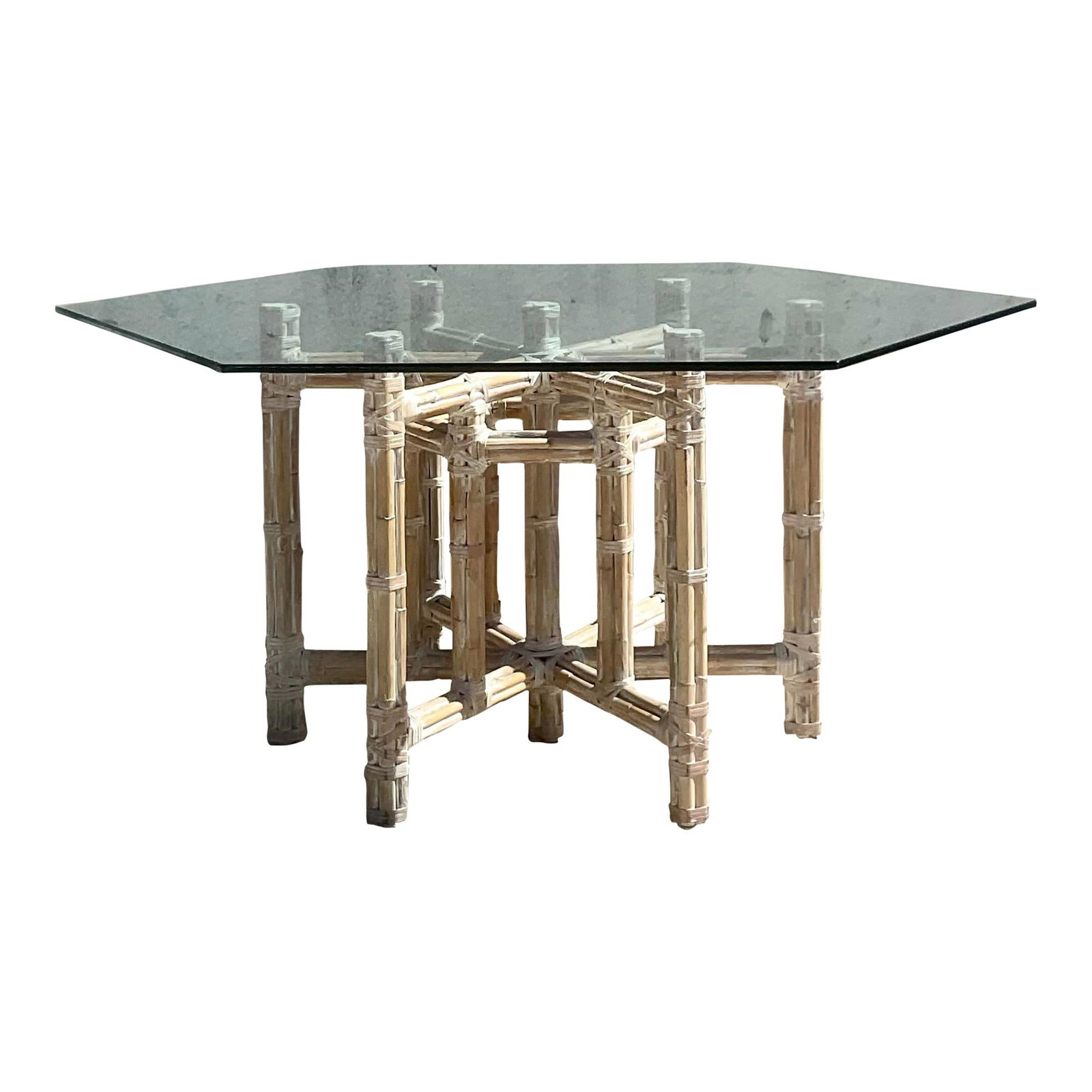 Vintage McGuire Style Coastal Bamboo Dining Table with Glass Top: Vintage McGuire Style Coastal Bamboo Dining Table with Glass Top This exquisite vintage Coastal dining table features a stylish bundled rattan design with a stunning cerused finish. The table has a un