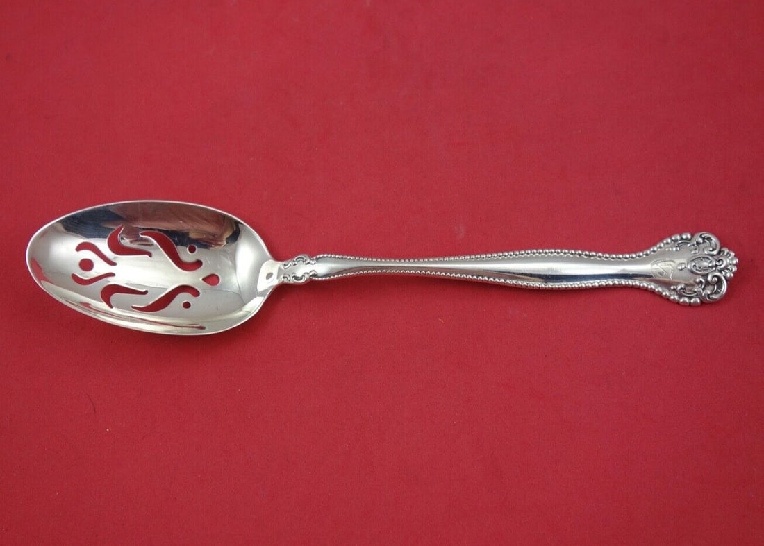 Alvin Raleigh Sterling Silver Pierced Serving Spoon 8 3/8" Monogrammed: Alvin Raleigh Sterling Silver Pierced Serving Spoon 8 3/8" Monogrammed This elegant Raleigh by Alvin serving spoon is crafted from high-quality sterling silver, featuring a pierced design that adds a 