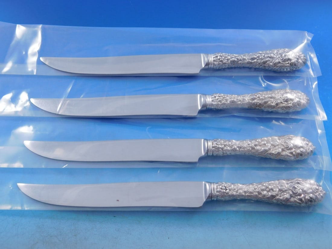 Stieff Rose Sterling Silver 4pc Texas Sized Steak Knife Set: Stieff Rose Sterling Silver 4pc Texas Sized Steak Knife Set Experience dining at its finest with the Rose by Stieff Sterling Silver Steak Knife Set. This exquisite 4-piece set features large Texas-siz