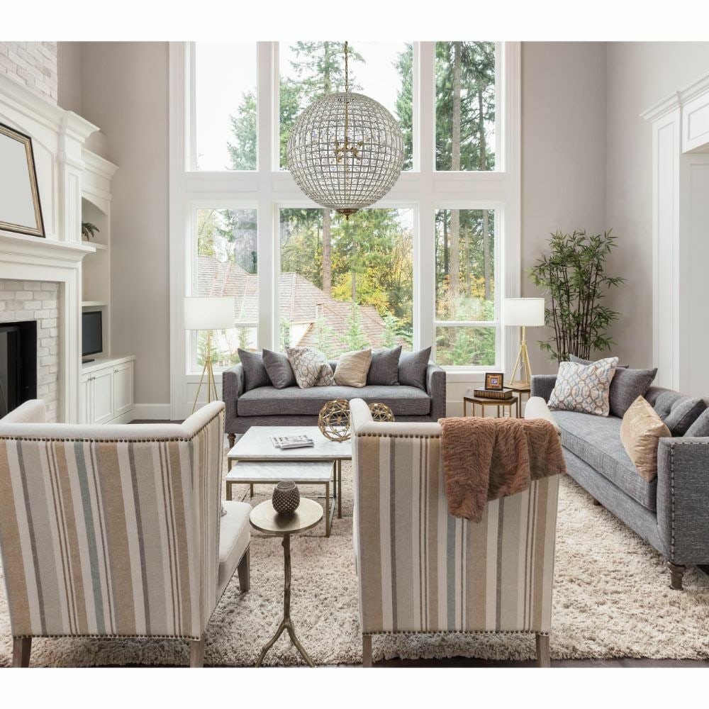 Olivia 8-Light French Gold Crystal Chandelier 36 x 50: Olivia 8-Light French Gold Crystal Chandelier 36 x 50 This large modern chandelier features eight lights and a striking combination of French gold and clear royal cut crystals. Designed in a sphere gl