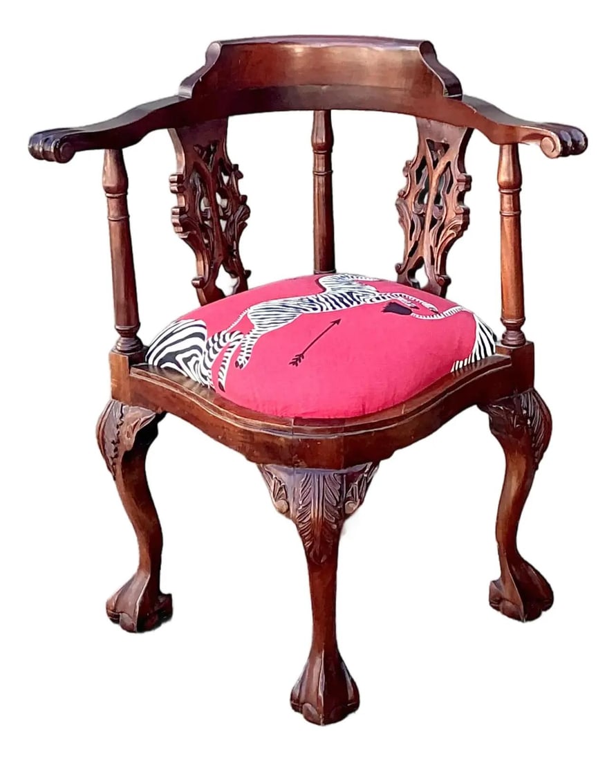 Mahogany Chippendale Corner Armchair with Zebra Upholstery: Mahogany Chippendale Corner Armchair with Zebra Upholstery This vintage corner chair showcases a harmonious blend of traditional English Chippendale-inspired design and bold contemporary upholstery. C