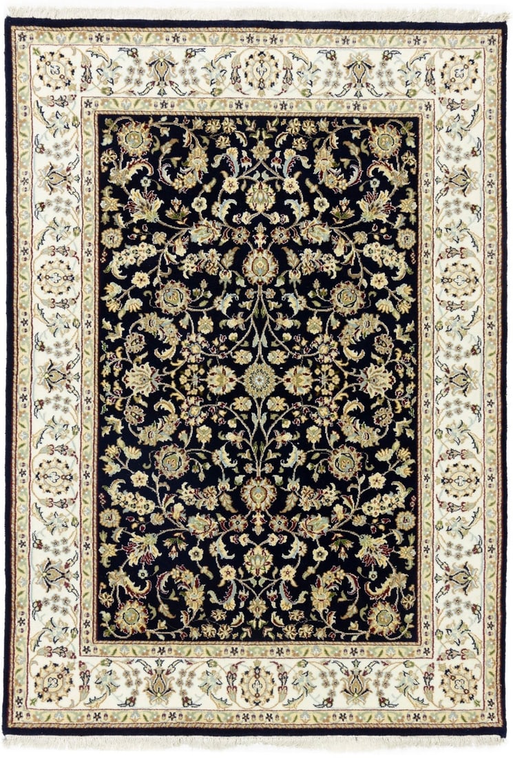 Floral Wool and Silk Area Rug Hand-Knotted Indo-Nain 5'5 x 7'11: Floral Wool and Silk Area Rug Hand-Knotted Indo-Nain 5'5 x 7'11 This handmade Indo-Nain rug features a dark navy floral pattern with accents of cream, red, buff, green, brown, tan, and light gray. Cra