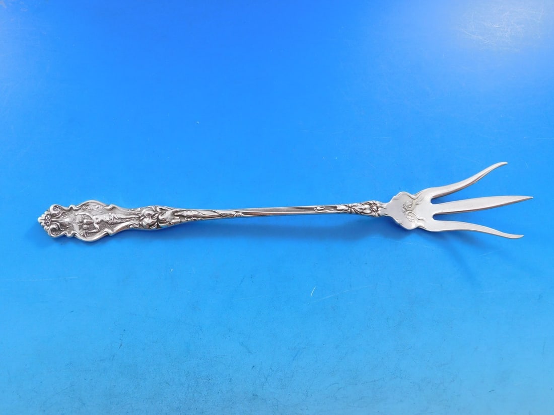 Wallace Irian Sterling Silver 8.5 Inch Lettuce Fork Serving Piece: Wallace Irian Sterling Silver 8.5 Inch Lettuce Fork Serving Piece This exquisite lettuce fork from the Irian pattern by Wallace features a stunning Art Nouveau design, making it a perfect addition to 