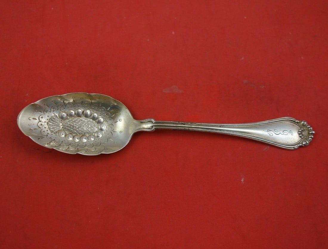 Dominick & Haff Century Sterling Silver Berry Spoon Pineapple 8 1/4": Dominick & Haff Century Sterling Silver Berry Spoon Pineapple 8 1/4" This exquisite serving spoon from Dominick & Haff features a stunning pineapple design in the bowl, characteristic of the Century p