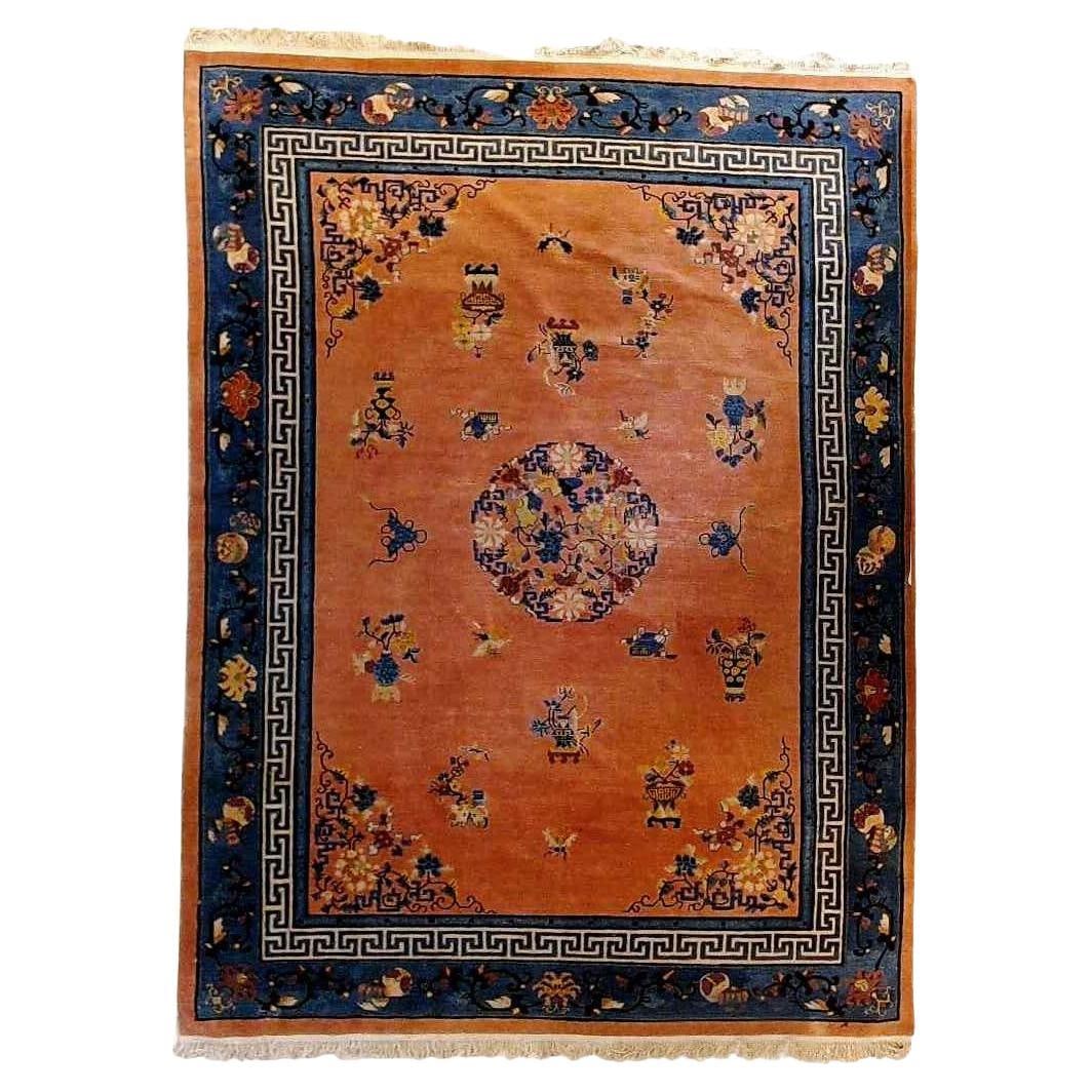 Large Early 20th Century Peking Wool Rug Garden Floral and Bird Motif 148 x 106 in: Large Early 20th Century Peking Wool Rug Garden Floral and Bird Motif 148 x 106 in This antique Peking Chinese Oriental wool rug from circa 1920 features an elegant design with garden flowers and bird