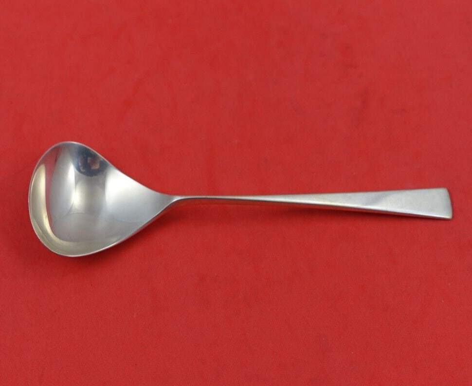 Reed and Barton Dimension Sterling Silver Sauce Ladle 5 5/8": Reed and Barton Dimension Sterling Silver Sauce Ladle 5 5/8" This exquisite sauce ladle is crafted from sterling silver and features the elegant Dimension pattern by Reed & Barton. Measuring 5 5/8" in