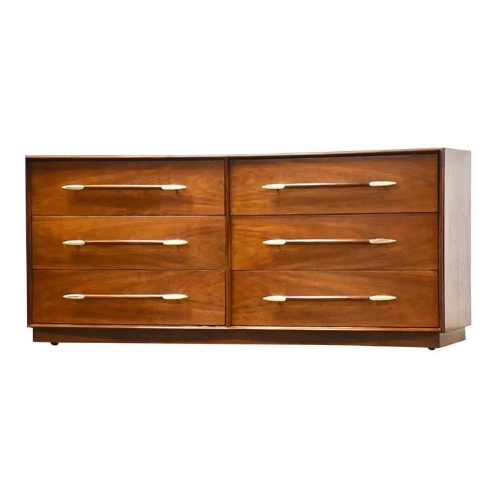 Robsjohn Gibbings Walnut Dresser with Aluminum Spear Tip Pulls: Robsjohn Gibbings Walnut Dresser with Aluminum Spear Tip Pulls This exquisite mid-century modern dresser, designed by T.H. Robsjohn Gibbings for Widdicomb, features a stunning walnut finish and six sp