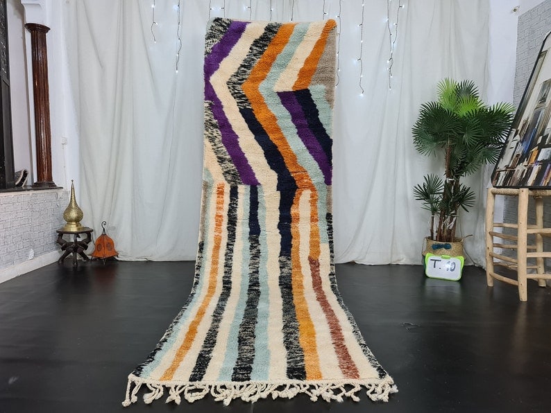Handmade Moroccan Berber Wool Runner Rug 2 x 10 Feet: Handmade Moroccan Berber Wool Runner Rug 2 x 10 Feet Discover the elegance of this Handmade Moroccan Berber Wool Runner Rug. Crafted by skilled local Berber women weavers in the Atlas Mountains, this 