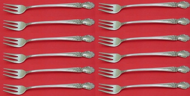 International Silver Brocade Sterling Silver Cocktail Fork Set 12 Pieces: International Silver Brocade Sterling Silver Cocktail Fork Set 12 Pieces This exquisite 12-piece cocktail fork set features the elegant Brocade pattern by International Silver. Each fork measures 5 1/