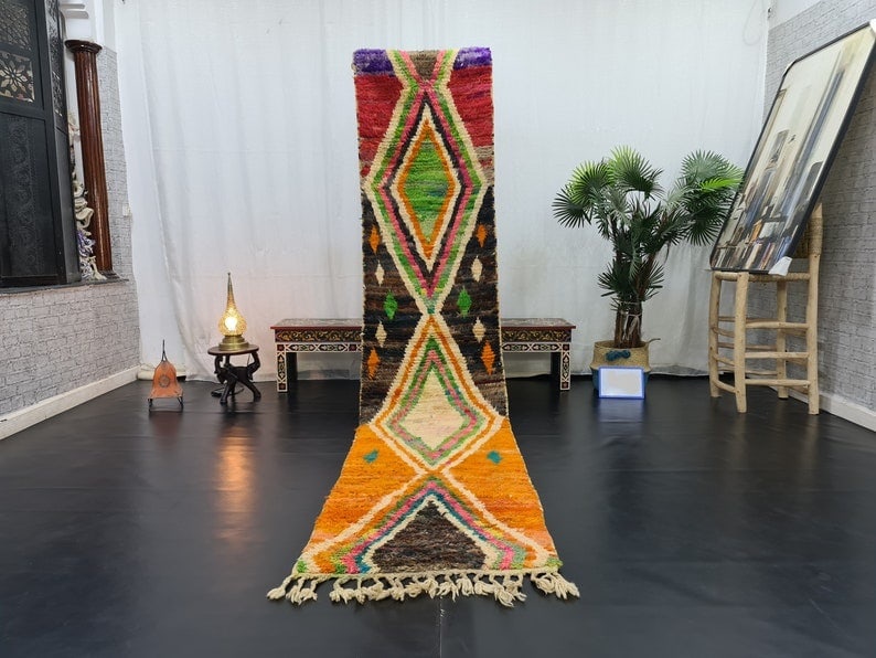 Authentic Handmade Moroccan Berber Runner Rug 2 x 10 ft: Authentic Handmade Moroccan Berber Runner Rug 2 x 10 ft Enhance your space with this stunning authentic handmade Moroccan Berber Runner Rug. Featuring a vibrant palette of orange, red, green, and blac