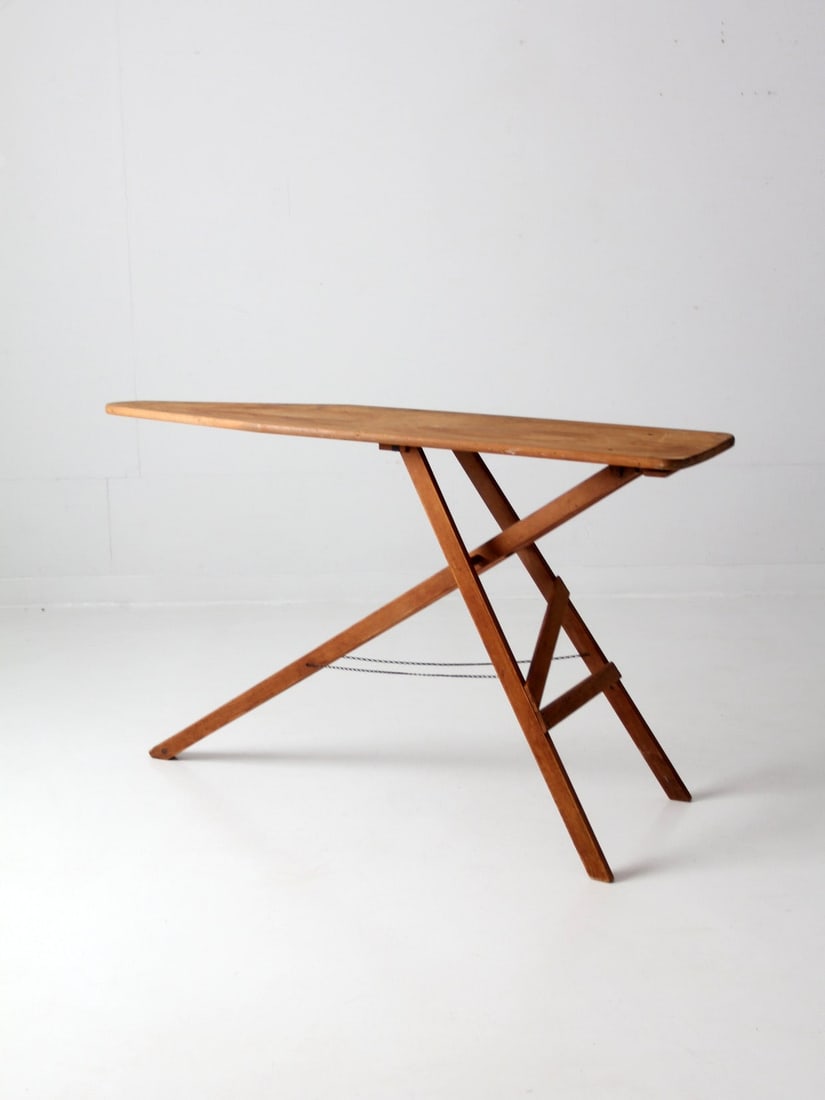 Vintage Antique Wooden Ironing Board with Iron Hardware: Vintage Antique Wooden Ironing Board with Iron Hardware Discover a charming antique wooden ironing board from the early 20th century, ideal for those who appreciate vintage farmhouse decor. This funct