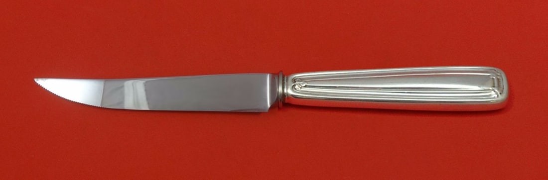 Tiffany & Co. Saint Dunstan Custom Sterling Silver Steak Knife 8.5": Tiffany & Co. Saint Dunstan Custom Sterling Silver Steak Knife 8.5" This exquisite steak knife from Tiffany & Co. features the elegant Saint Dunstan pattern. Crafted with a sterling silver hollow hand