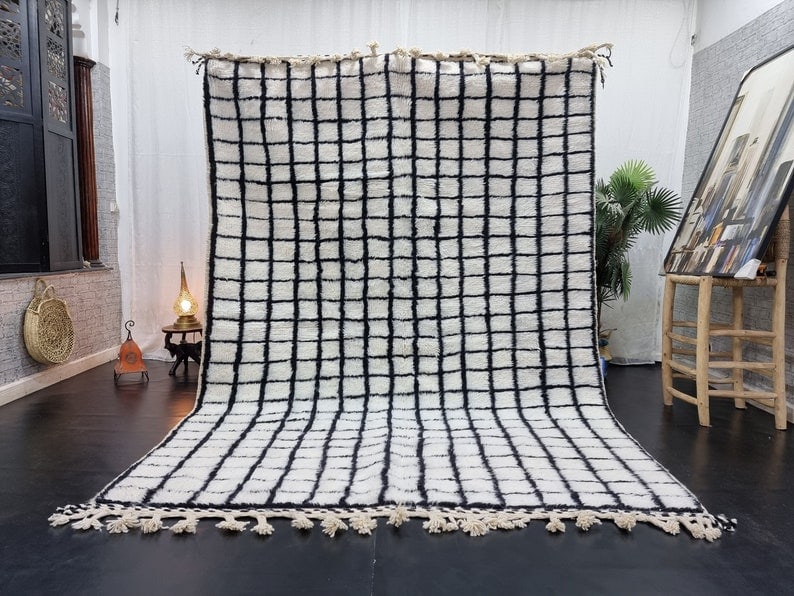 Authentic White & Black Checkered Rug 100% Wool 10 x 6.56 ft Morocco: Authentic White & Black Checkered Rug 100% Wool 10 x 6.56 ft Morocco Enhance your living space with this authentic White & Black Checkered Rug, meticulously handwoven by local Berber women weavers in 