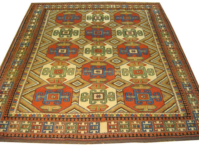 6' x 7' Chechen Kazak Wool on Wool Rug: 6' x 7' Chechen Kazak Wool on Wool Rug Free continental US Shipping This exquisite Chechen Kazak rug measures 6' x 7' and is crafted from high-quality wool on a wool foundation. Known for its durabili