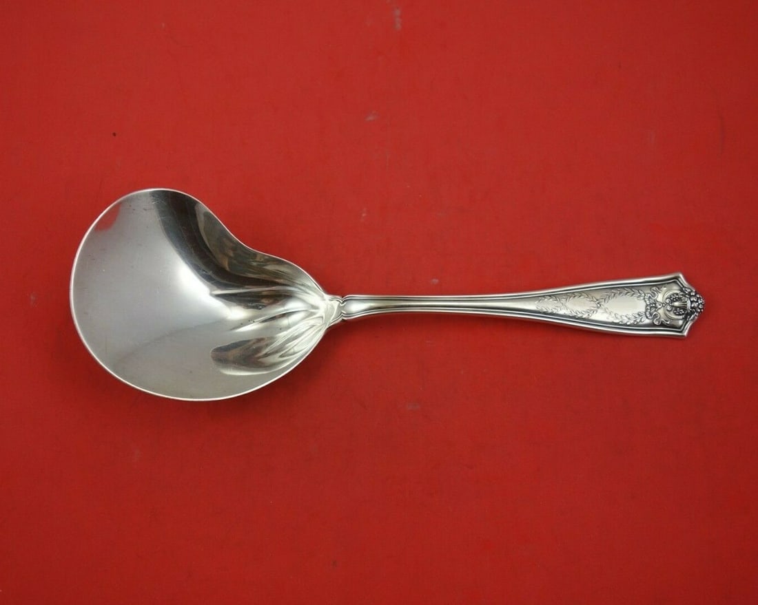 Tiffany & Co Winthrop Sterling Silver Berry Spoon Conch 9.5": Tiffany & Co Winthrop Sterling Silver Berry Spoon Conch 9.5" This exquisite Winthrop berry spoon from Tiffany & Co. is crafted in sterling silver and features a stunning conch shape design. Measuring 