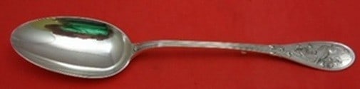 Tiffany Co Japanese Sterling Silver Serving Spoon with Button 12 1/2": Tiffany Co Japanese Sterling Silver Serving Spoon with Button 12 1/2" Tiffany & Co. Japanese sterling silver stuffing spoon with button, measuring 12 1/2 inches. It features a multi-motif Japanese pat