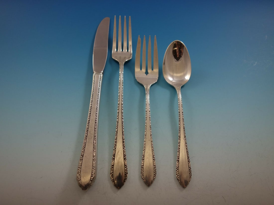 Royal Crest Wild Flower 4pc Sterling Silver Place Setting: Royal Crest Wild Flower 4pc Sterling Silver Place Setting Enhance your dining experience with this exquisite 4-piece place setting in the Wild Flower pattern by Royal Crest. Crafted from high-quality 