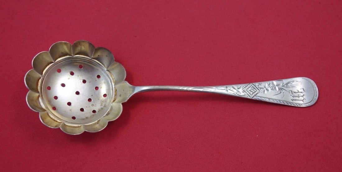 Vanderslice Antique Engraved Wheat Sterling Silver Sugar Sifter 7 1/8 inches: Vanderslice Antique Engraved Wheat Sterling Silver Sugar Sifter 7 1/8 inches This exquisite Antique Engraved Wheat sugar sifter, crafted by Vanderslice, showcases the elegance of 19th-century design. 
