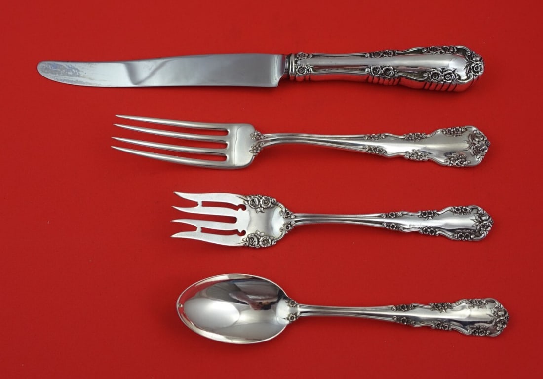 International Sterling Silver Wild Rose Old 4-Piece Place Setting: International Sterling Silver Wild Rose Old 4-Piece Place Setting Enhance your dining experience with this exquisite 4-piece dinner size place setting in the Wild Rose Old pattern by International. Cr