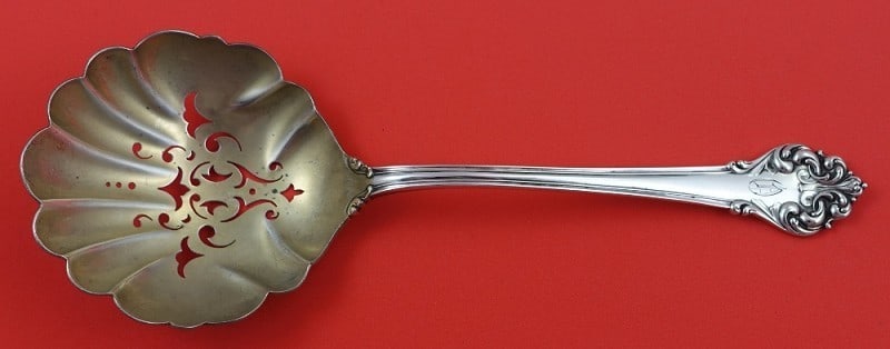 Reed and Barton Elegante Sterling Silver Slotted Pea Spoon 9 Inch: Reed and Barton Elegante Sterling Silver Slotted Pea Spoon 9 Inch A sterling silver slotted pea spoon in the Elegante aka L'elegante pattern by Reed & Barton. It features a light gold wash, is monogra