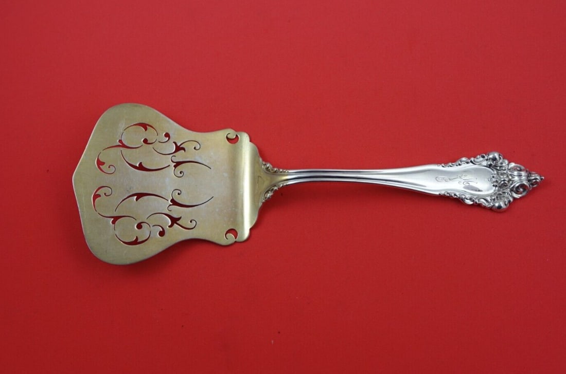 Reed and Barton La Splendide Sterling Silver Waffle Server Pierced 9 3/4": Reed and Barton La Splendide Sterling Silver Waffle Server Pierced 9 3/4" Discover the elegance of the La Splendide serving fork by Reed & Barton, a stunning piece crafted from sterling silver. This r