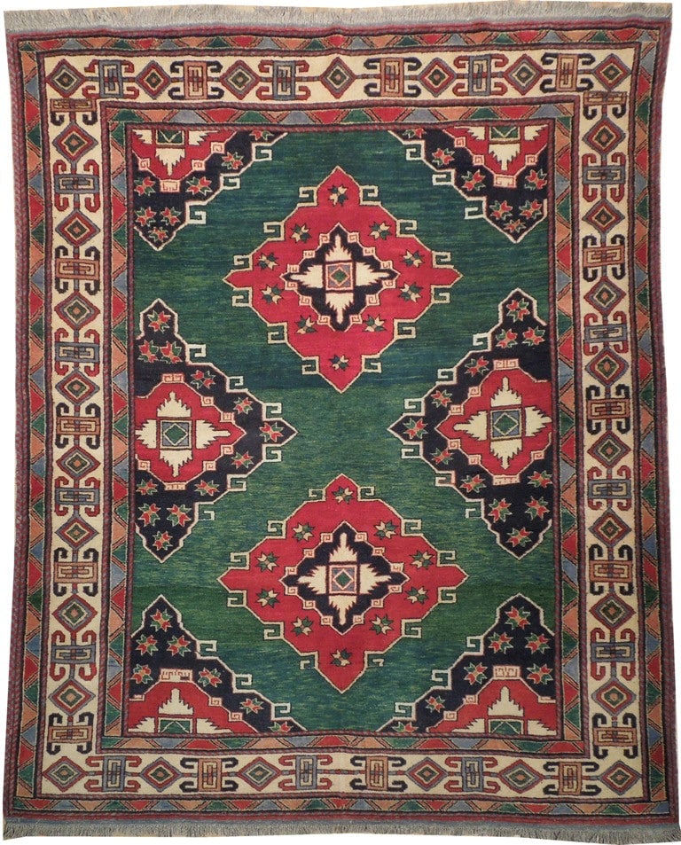 6 x 7 Green Hand-Knotted Afghan Kazak Rug Wool-on-Wool: 6 x 7 Green Hand-Knotted Afghan Kazak Rug Wool-on-Wool Free continental US Shipping This 6 x 7 Green Hand-Knotted Kazak Afghan Rug is crafted in Afghanistan with authentic wool-on-wool construction. I