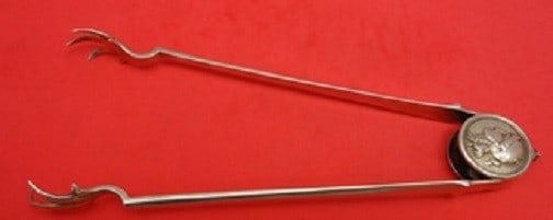 Gorham Medallion Sterling Silver Sugar Tong 6.5 Unusual Design: Gorham Medallion Sterling Silver Sugar Tong 6.5 Unusual Design Elevate your dining experience with this exquisite Sterling Silver Sugar Tong from the renowned Gorham brand. Crafted in the elegant Meda