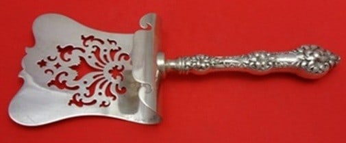 Sterling Asparagus Server 9 3/4 Old Orange Blossom Alvin Gorham: Sterling Asparagus Server 9 3/4 Old Orange Blossom Alvin Gorham Sterling silver asparagus server in the Old Orange Blossom pattern by Alvin / Gorham. This serving piece features a hollow handle with a