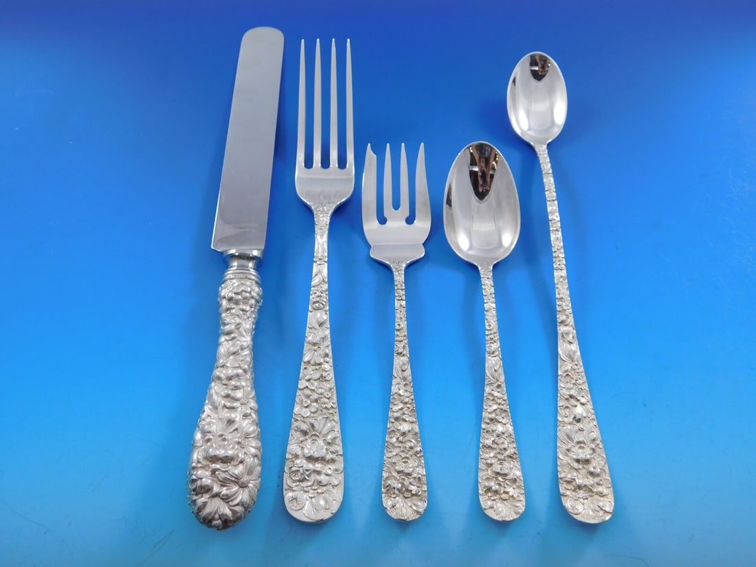 Stieff Rose Sterling Silver 60 Piece Repousse Flatware Service for 12: Stieff Rose Sterling Silver 60 Piece Repousse Flatware Service for 12 This Stieff Rose sterling silver flatware set features an elaborate repousse floral design introduced in 1892. The set includes 60