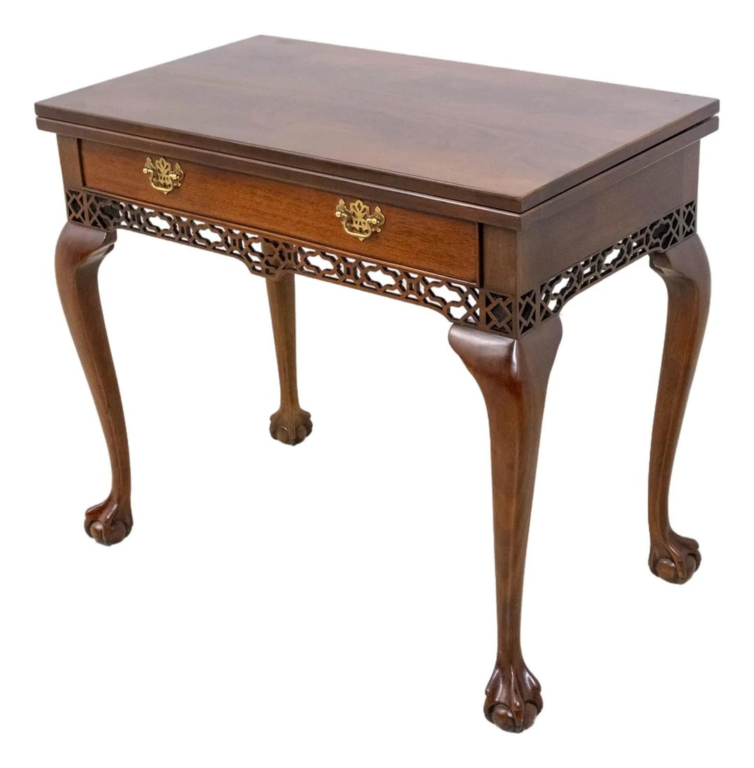 Wellington Hall Chippendale Style Mahogany Flip Top Table: Wellington Hall Chippendale Style Mahogany Flip Top Table This exquisite Wellington Hall Ball & Claw Mahogany Flip Top Hall Table showcases a stunning Chippendale design with elegant ball and claw fee