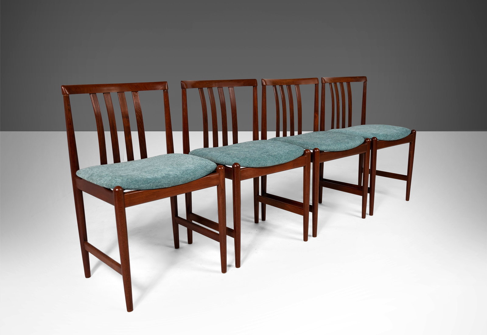 Set of 4 Danish Modern Rosewood Dining Chairs After Arne Vodder 1960s: Set of 4 Danish Modern Rosewood Dining Chairs After Arne Vodder 1960s This exquisite set of four contoured dining chairs showcases a beautiful Danish Modern design inspired by Arne Vodder, crafted aro