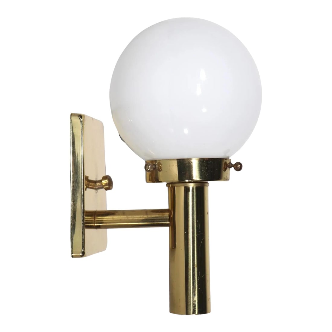 1980s Post Modern Brass Wall Sconce with White Glass Globe: 1980s Post Modern Brass Wall Sconce with White Glass Globe Elevate your space with this stunning Post Modern wall sconce from the 1980s. This architectural piece features a striking brass frame paired