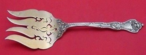 Reed Barton Intaglio Sterling Fish Serving Fork 9 7 8 Gold Washed Pierced: Reed Barton Intaglio Sterling Fish Serving Fork 9 7 8 Gold Washed Pierced This is a sterling silver fish serving fork in the Intaglio pattern by Reed & Barton. The fork features a gold-washed, pierced