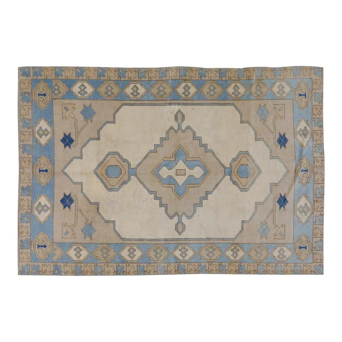 Hand-Knotted Wool Anatolian Rug in Tan 5'2" x 7'10": Hand-Knotted Wool Anatolian Rug in Tan 5'2" x 7'10" This vintage Turkish Anatolian rug is hand-knotted from wool using traditional rug-making techniques. It features a tan color and a rich texture, of