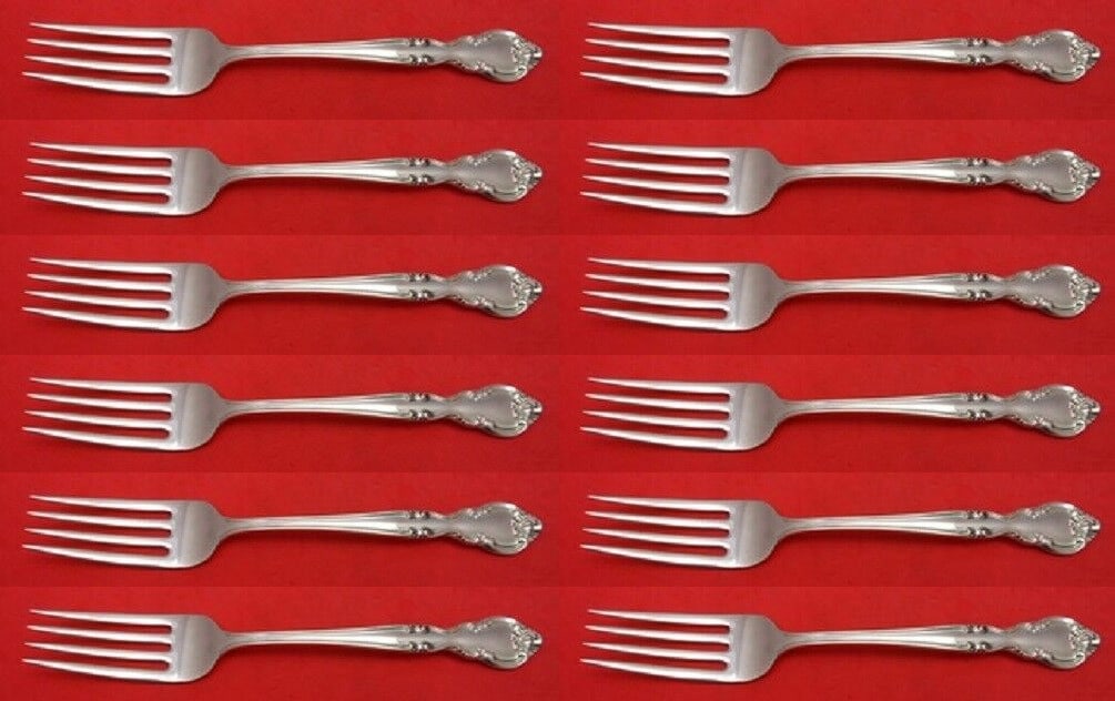 Easterling American Classic Sterling Silver Salad Fork Set 12pc 6.5": Easterling American Classic Sterling Silver Salad Fork Set 12pc 6.5" This exquisite 12-piece set of salad forks features the elegant American Classic pattern by Easterling. Each fork measures 6 1/2" a