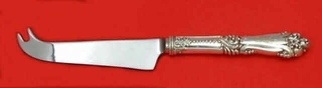 Reed & Barton La Marquise Sterling Silver Cheese Knife 8 1/4 in: Reed & Barton La Marquise Sterling Silver Cheese Knife 8 1/4 in Introducing the La Marquise Cheese Knife by Reed & Barton, a stunning piece crafted from high-quality sterling silver. This custom-made 
