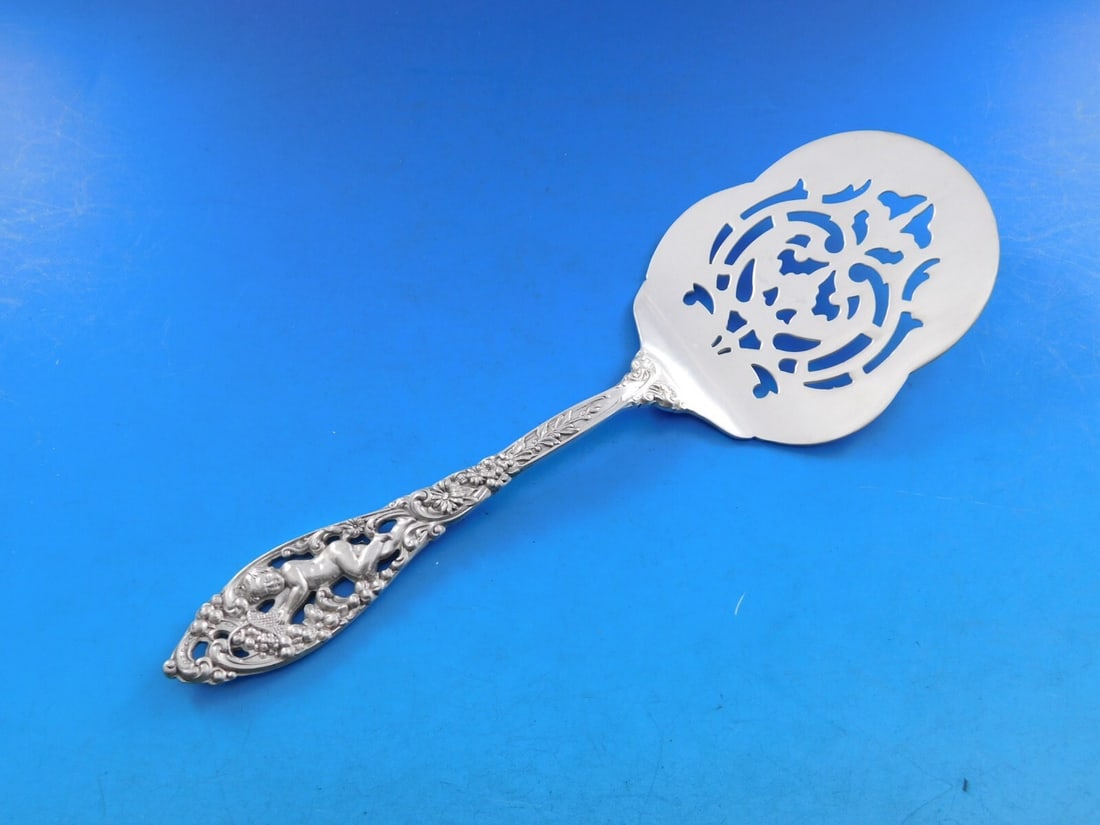Dominick & Haff Labors of Cupid Sterling Silver Tomato Server 30 Pcd 7 7/8 in Art Nouveau: Dominick & Haff Labors of Cupid Sterling Silver Tomato Server 30 Pcd 7 7/8 in Art Nouveau This exquisite tomato server by Dominick & Haff showcases the intricate design of the Labors of Cupid pattern.