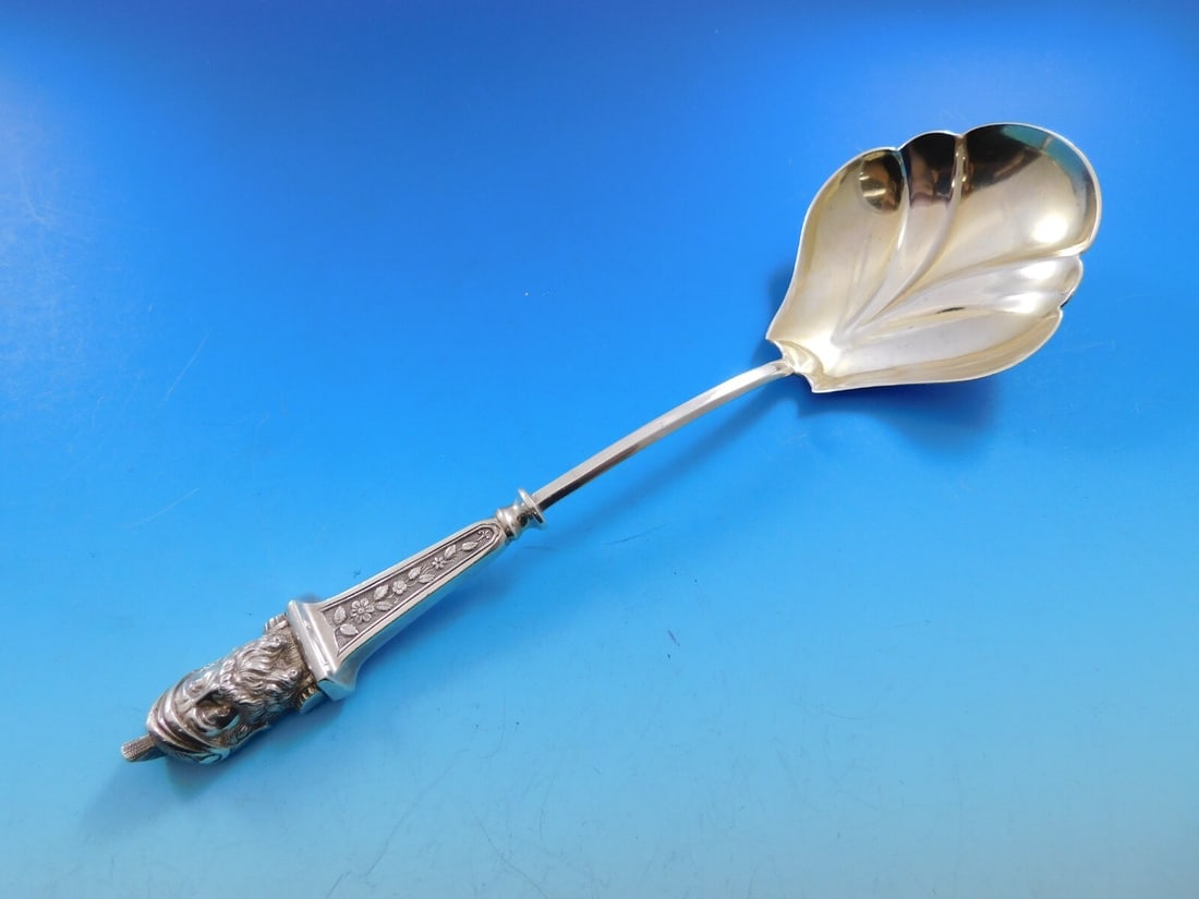 Albert Coles Bust Sterling Silver Berry Spoon Gold Wash Fluted Design: Albert Coles Bust Sterling Silver Berry Spoon Gold Wash Fluted Design This stunning serving spoon by Albert Coles is crafted from sterling silver and showcases a unique figural design. Measuring 8 3/4