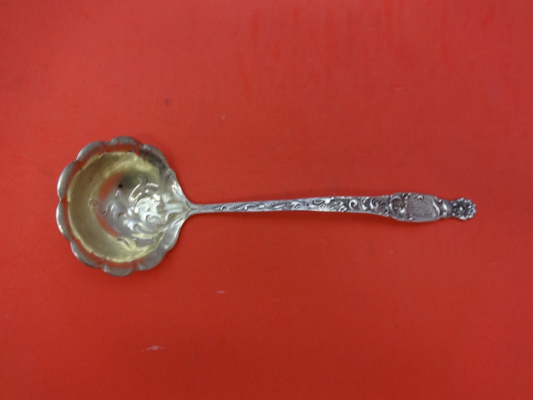 Whiting Heraldic Sterling Silver Sauce Ladle Gold Washed 6": Whiting Heraldic Sterling Silver Sauce Ladle Gold Washed 6" This exquisite sauce ladle is crafted from sterling silver and features a beautiful gold washed design in the bowl. The ladle is part of the