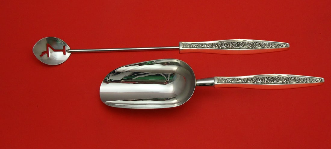 Reed & Barton Renaissance Scroll Sterling Silver 2pc Bar Set: Reed & Barton Renaissance Scroll Sterling Silver 2pc Bar Set This exquisite 2-piece Hostess Set from Reed & Barton features the elegant Renaissance Scroll pattern. Crafted in solid sterling silver, th