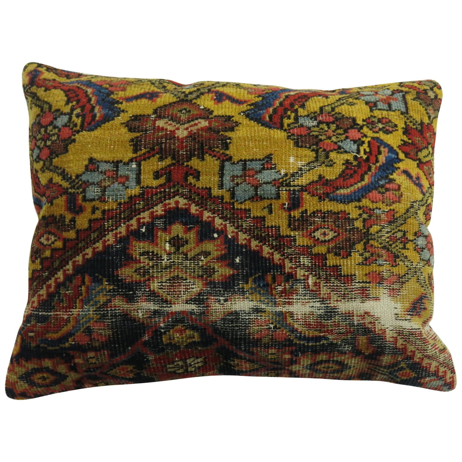 Sultanabad Persian Rug Pillow Cotton Back Navy Yellow: Sultanabad Persian Rug Pillow Cotton Back Navy Yellow This pillow is crafted from an antique Persian Mahal rug, featuring a cotton back and foam filling. It showcases navy blue and yellow accents in a