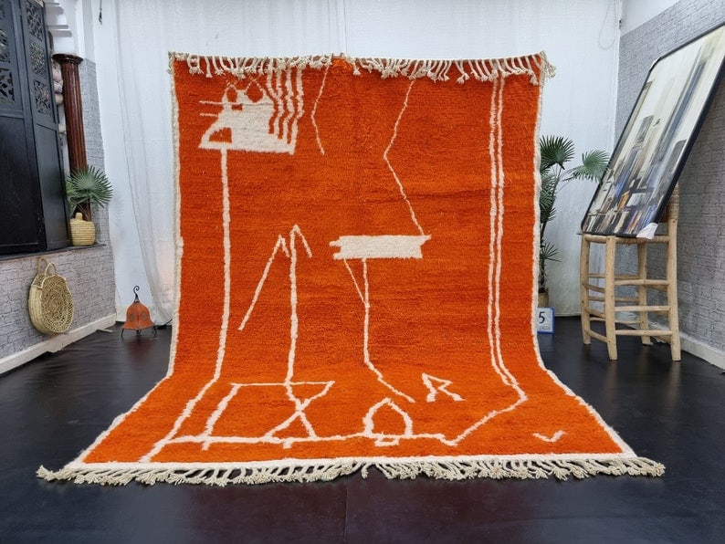 Authentic Handmade Moroccan Berber Wool Rug Soft Orange 9.84 x 6.56 Feet: Authentic Handmade Moroccan Berber Wool Rug Soft Orange 9.84 x 6.56 Feet Introducing an elegant, soft orange handmade Moroccan Berber wool area rug. This exquisite piece is meticulously handwoven in t