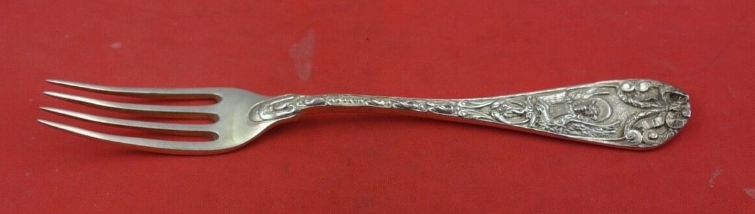 Italian Sterling Silver Dessert Fork 6.25 inches Floral Pattern: Italian Sterling Silver Dessert Fork 6.25 inches Floral Pattern This exquisite dessert fork is crafted from Italian sterling silver, featuring a beautiful pattern with a basket of flowers, bows, and s