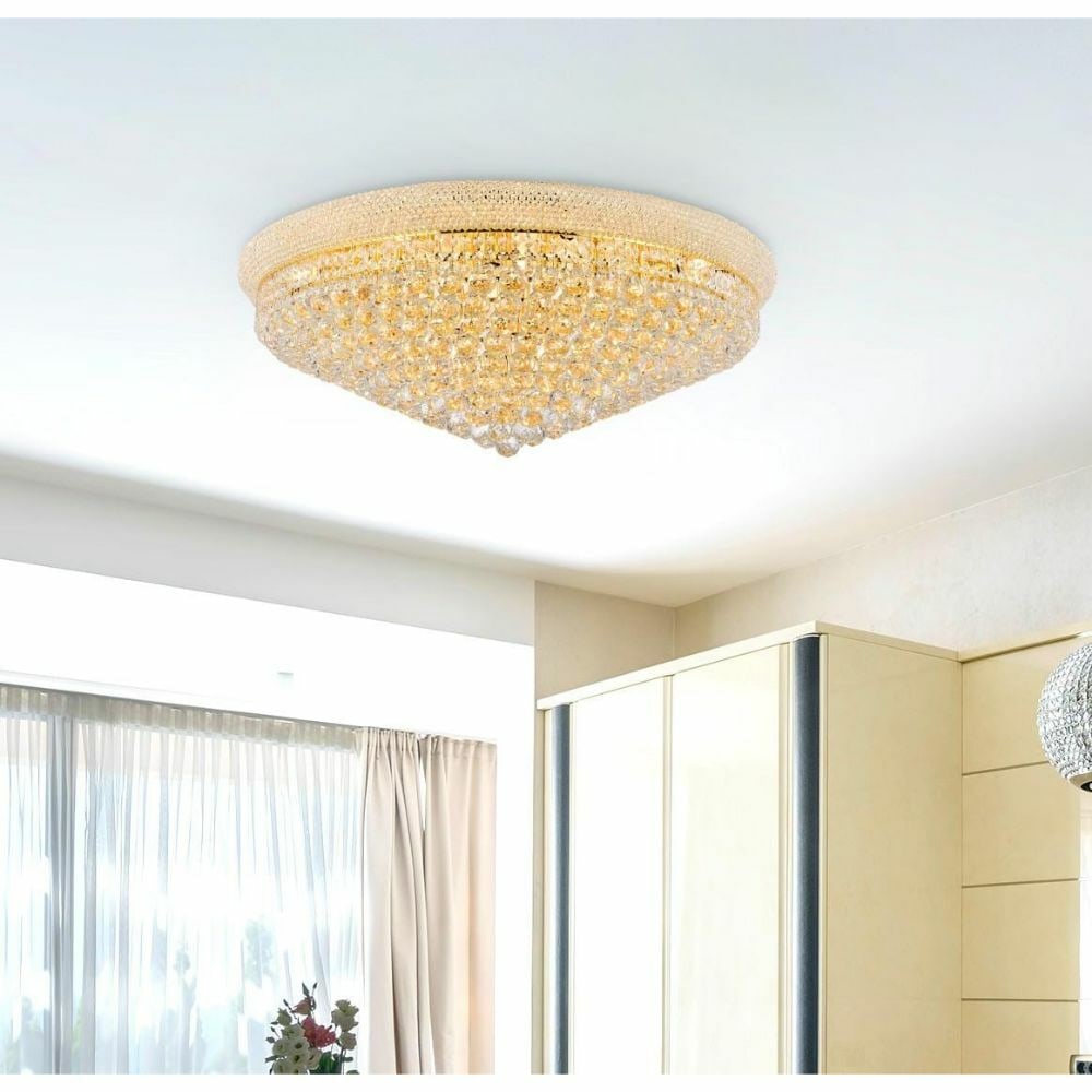 Lighting Primo 20 Light Gold Crystal Flush Mount 36 in: Lighting Primo 20 Light Gold Crystal Flush Mount 36 in Pre-owned 20-light crystal chandelier in a gold finish with a contemporary empire-style semi flush mount design. It features clear crystal elemen
